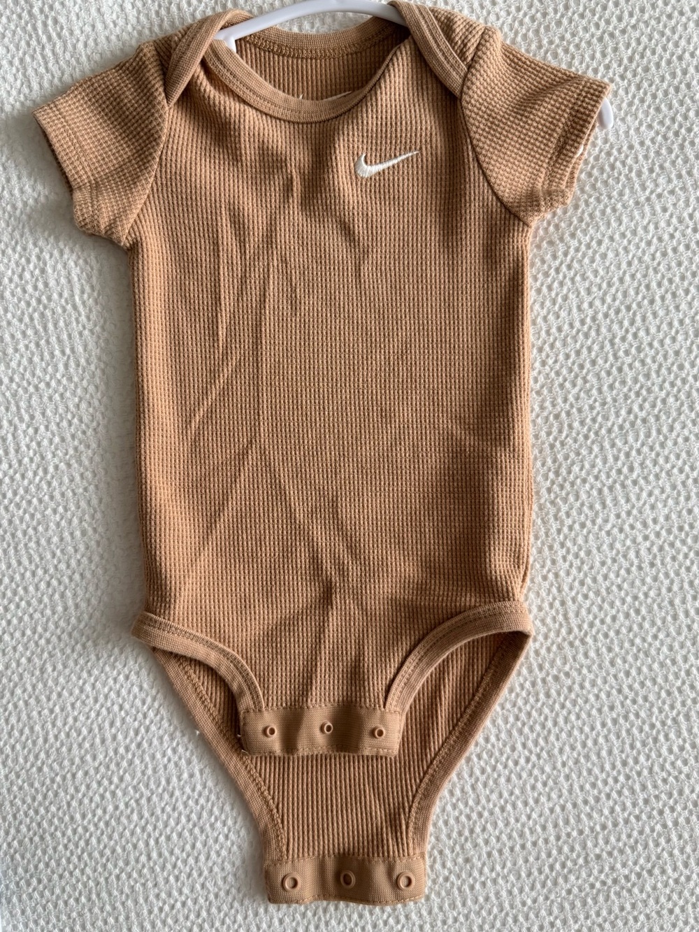Nike Tan Ribbed Baby Bodysuit with White Swoosh